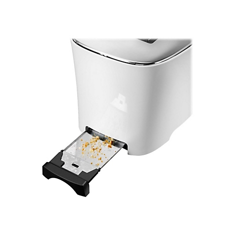Nahaufnahme eines weißen Toasters mit herausgezogener Krümelschublade, in der sich Brotkrümel befinden.