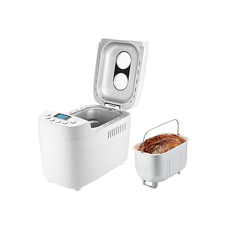 Ein weißer Brotbackautomat mit geöffnetem Deckel steht neben einem Backbehälter mit frischem Brot.