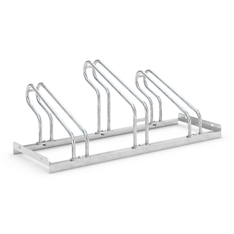 Metal bike rack, silver colored. There are several brackets to park bikes.