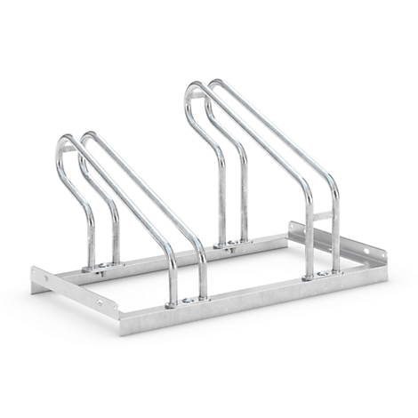 Metal bike rack featuring curved tubes and a rectangular base plate.