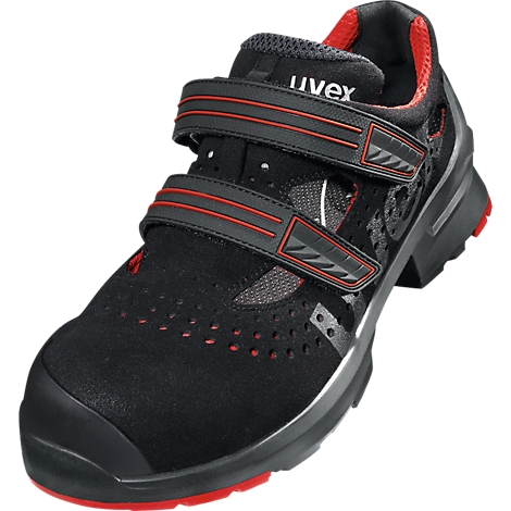 Black safety shoe with red accents, Velcro straps and the inscription "uvex".