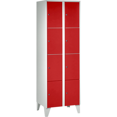 Cabinet with red doors and white body. Eight doors, each with a knob. Stands on four white feet.