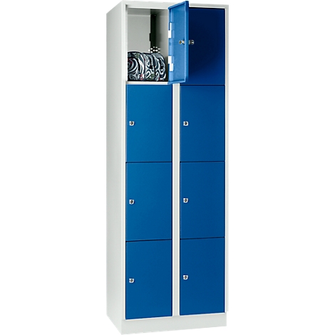 A two-tone locker with an open blue door, showing a bag inside.