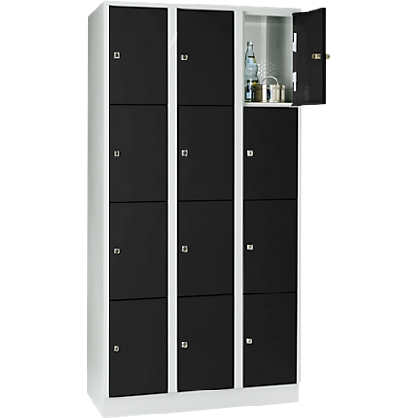 A locker with black doors, one door is open, bottle and cans visible.