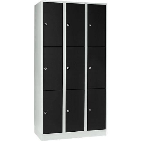Black locker with nine doors, in white frame.