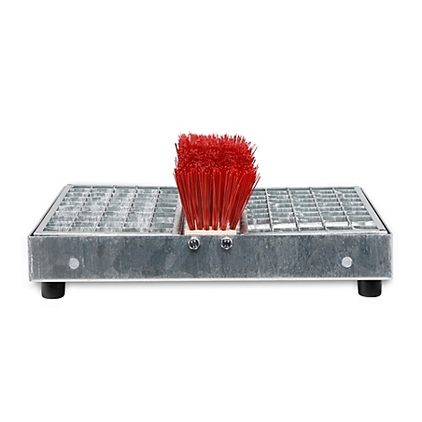 Metal doormat with brush and red bristle head. On white background.