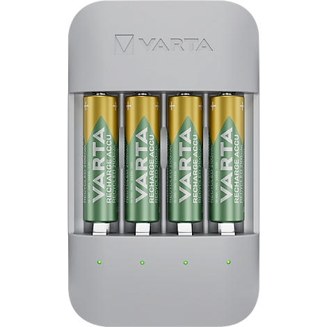 Grey battery charger with four AA batteries from VARTA. The batteries are in the charger; green lights are on below.