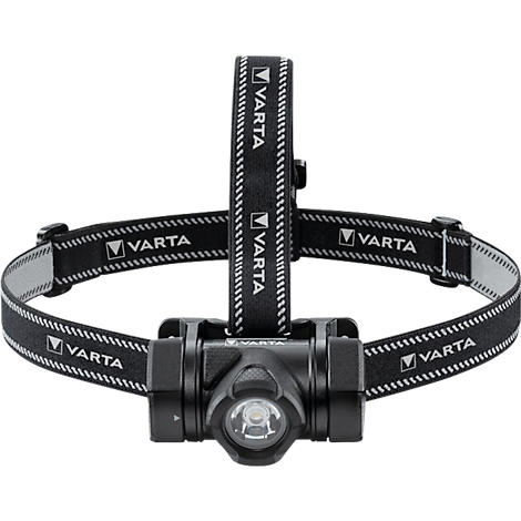 Black headlamp with white VARTA logos on the straps. The lamp has a round light. The headband is adjustable.