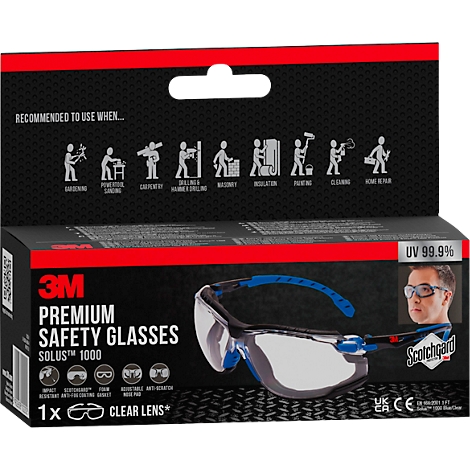 Blauwe en zilveren veiligheidsbril in verpakking. Op de verpakking staat "3M Premium Safety Glasses".