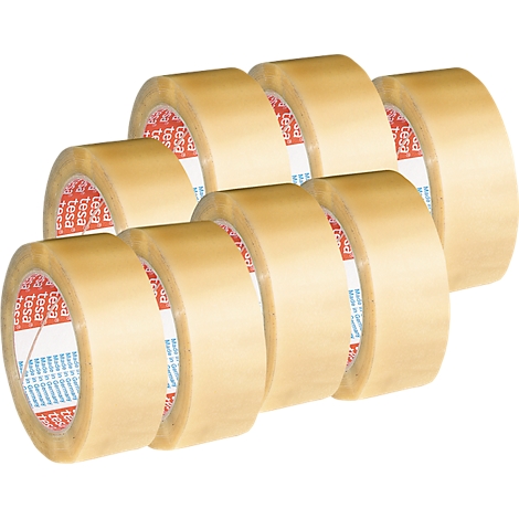 Zeven rollen tesatape, gerangschikt in een halve cirkel.