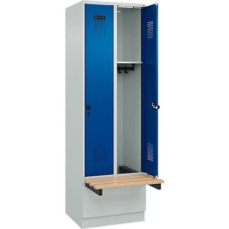 Casier bleu et blanc avec porte ouverte et banc.