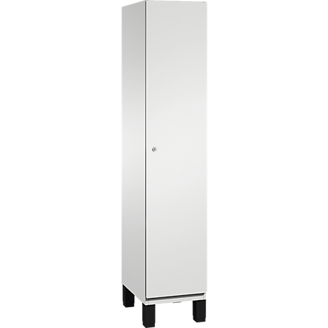 Armoire haute, blanche avec porte, sur pieds noirs.