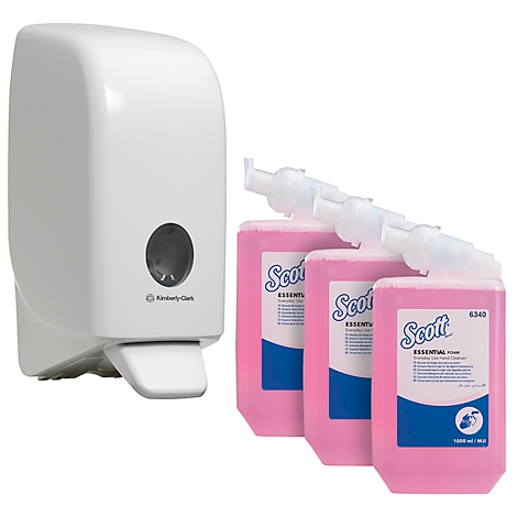 Witte zeepdispenser naast drie roze zeepflessen met blauw etiket.
