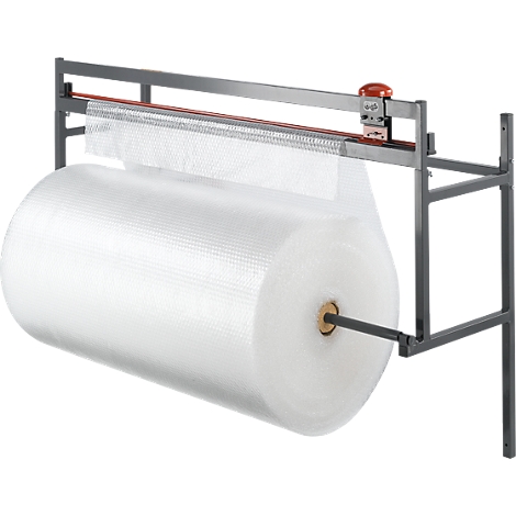 A packaging machine with a large roll of bubble wrap, ready to cut.