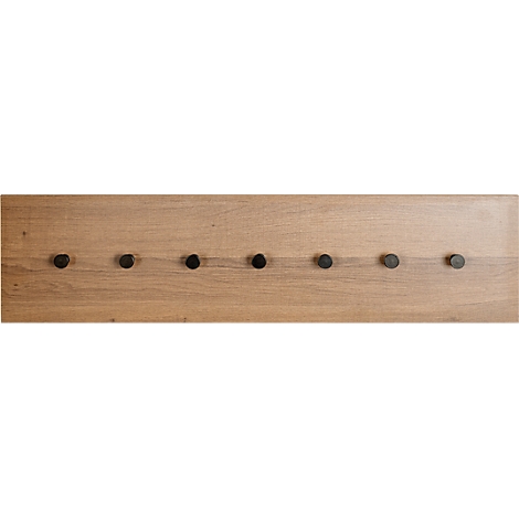 Holzbrett mit Reihe von 7 schwarzen Knöpfen, im Abstand angeordnet.
