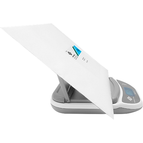 A white scale with a white sheet of paper on it. Blue and gray elements can be seen on the paper.
