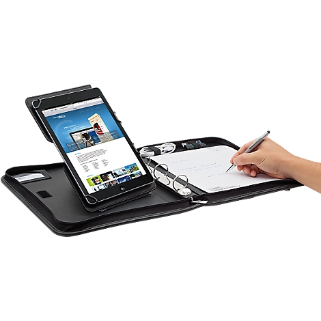 Black tablet case with pen holder, notepad and hand writing with a pen. A tablet with an open website is held.