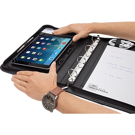 Person holding a black document case with an iPad. The case also has notepaper, a binder, and a charging cable.