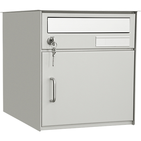 Gray metal mailbox with lock and door. The key is in the lock.