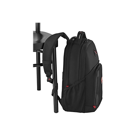 Schwarzer Rucksack an einem schwarzen Stuhl. Sichtbar sind die Schultergurte, ein rotes Detail und ein Netzfach.