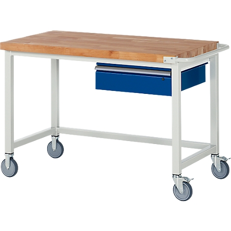 Mobiler Werkbanktisch mit heller Holzplatte, weißem Metallgestell, Rollen und einer blauen Schublade.