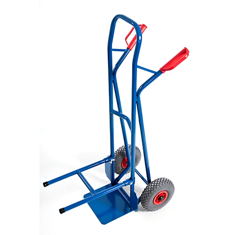 Blue hand truck with red handles and gray tires against a white background.