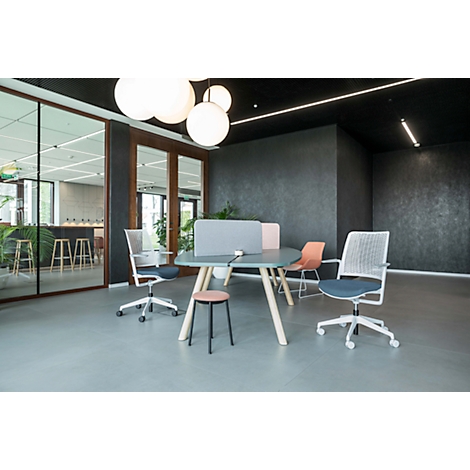 Office with desk, chairs and round lamps. Windows and a dark wall in the background.