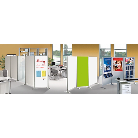 Office with partition walls. A white board with notes, two yellow and blue notes, and a green element.