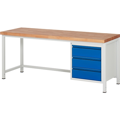 Workbench with wooden top, white frame and blue drawers.