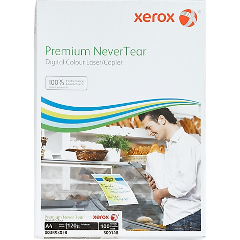 A pack of Xerox Premium NeverTear paper with a man standing in a bakery.