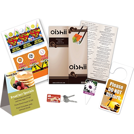 Assorted promotional materials: menu, door hanger, table tent, and labels, various designs.