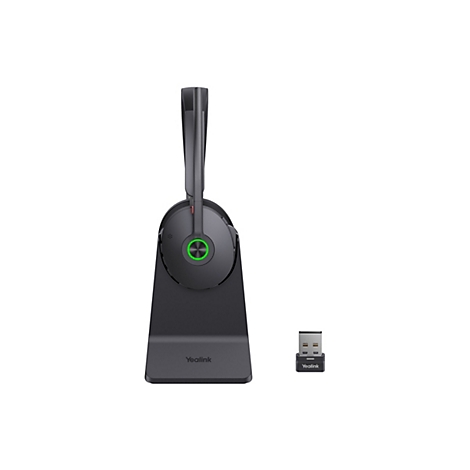 Drahtloses Headset auf einer Ladestation, USB-Dongle. Das Headset ist schwarz, die Station auch, mit grünem LED-Licht. Die Marke Yealink ist sichtbar.