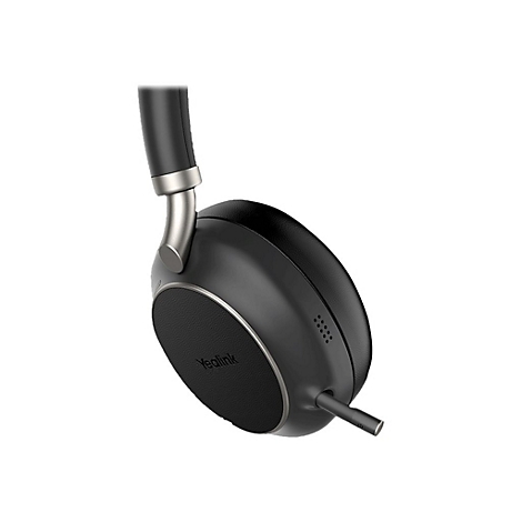 Casque supra-auriculaire noir avec des accents argentés, logo Yealink. Les coussinets et l'arceau sont visibles.