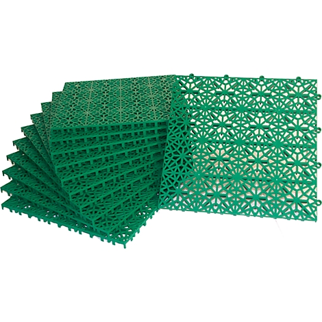 Green plastic tiles that interlock. A stack and loose tiles are visible.