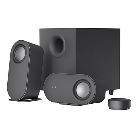 Dunkelgraues Lautsprechersystem mit Subwoofer, zwei Satellitenlautsprechern und einer Fernbedienung. Logos sind sichtbar.