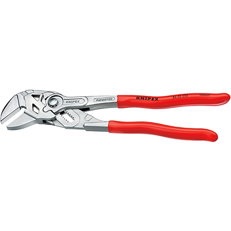 Eine Rohrzange, silberfarbenes Metall, rote Griffe, Marke KNIPEX, PATENTER. Die Zange ist geöffnet.