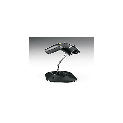 Scanner de codes-barres noir sur support argenté ondulé, base noire, fond gris.