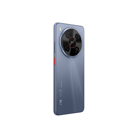 Blaues Smartphone im Profil. Runde Kameraeinheit, roter Power-Button, ZTE-Logo.