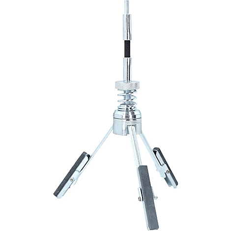 Werkzeug mit drei Armen und Schleifsteinen. Über dem Hauptteil befindet sich eine Feder und eine lange, dünne Metallstange.