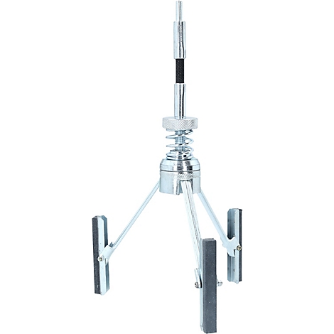 Ein Werkzeug, das aus Metallstangen, einer Feder und Schleifsteinen besteht.