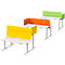 Three desks with yellow, orange, and green privacy screens. The tables are white, the frames silver.