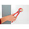 A red wrench holds a light rectangle against a white wall. An arm holds the wrench.