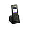Schwarzes Alcatel-Lucent DECT-Telefon in der Ladestation mit beleuchtetem Display.