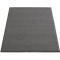 Alfombra gris con borde negro. Superficie texturizada en ángulo ligero.