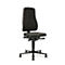 Black ergonomic office chair with high backrest and wheels.
