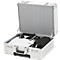 Opened silver suitcase with white polo shirt, black belt and black toiletry bag.