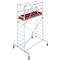 A silver scaffolding with a red shelf, blue wheels. A guardrail at the top.