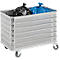 A silver waste bin on wheels, filled with a black and a blue garbage bag.