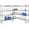 Stainless steel shelving in a lab or industrial setting. Shelves hold containers, boxes, and bottles.
