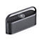 Grauer, tragbarer Soundcore-Bluetooth-Lautsprecher mit Tragegriff, Bedienelementen und perforierter Front.